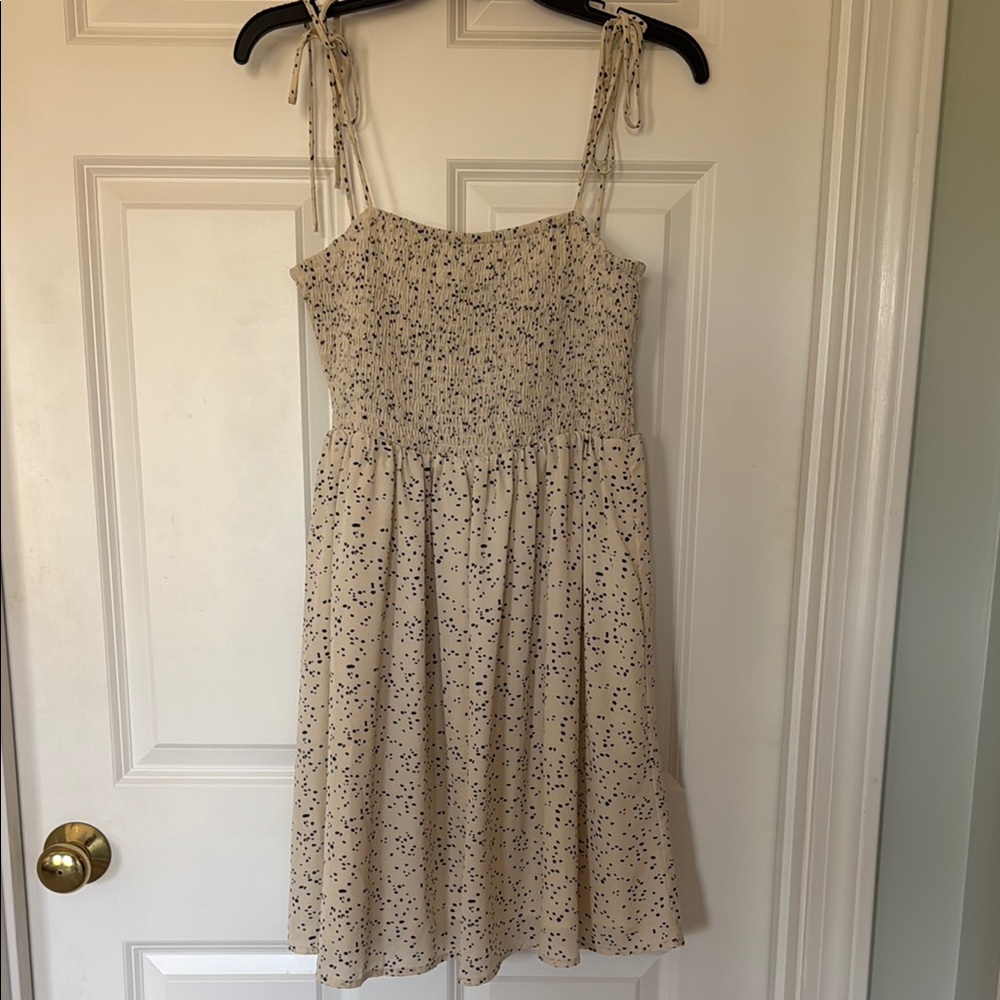 Elegant Cream Dress with Black Accents